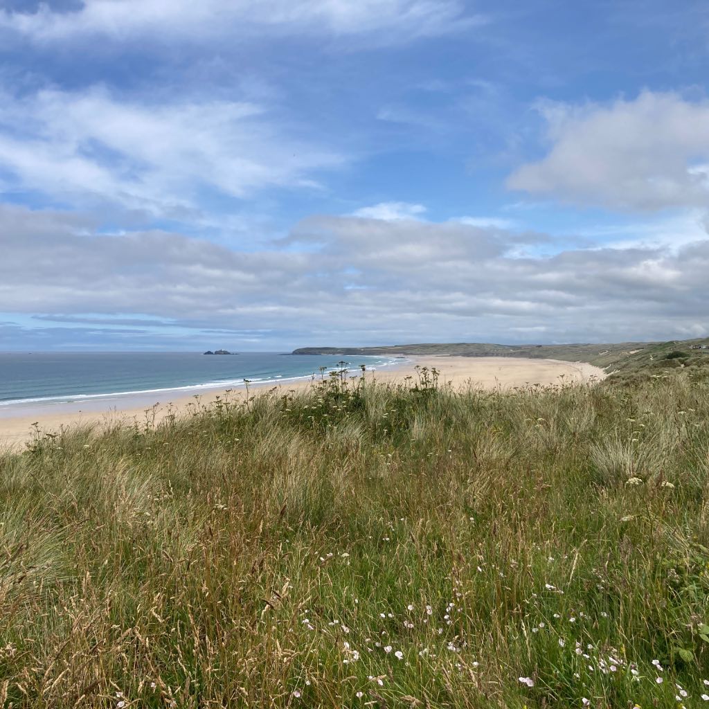 View from Mexico Towans View of sea, wide sandy beach and dunes on a sunny day